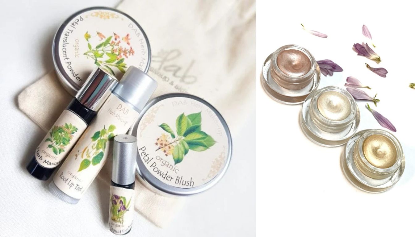 A curated display of Dab Herb Makeup products, including organic powders, lip tints, and cream-based cosmetics, arranged with botanical illustrations and flower petals to highlight their natural and vegan ingredients.