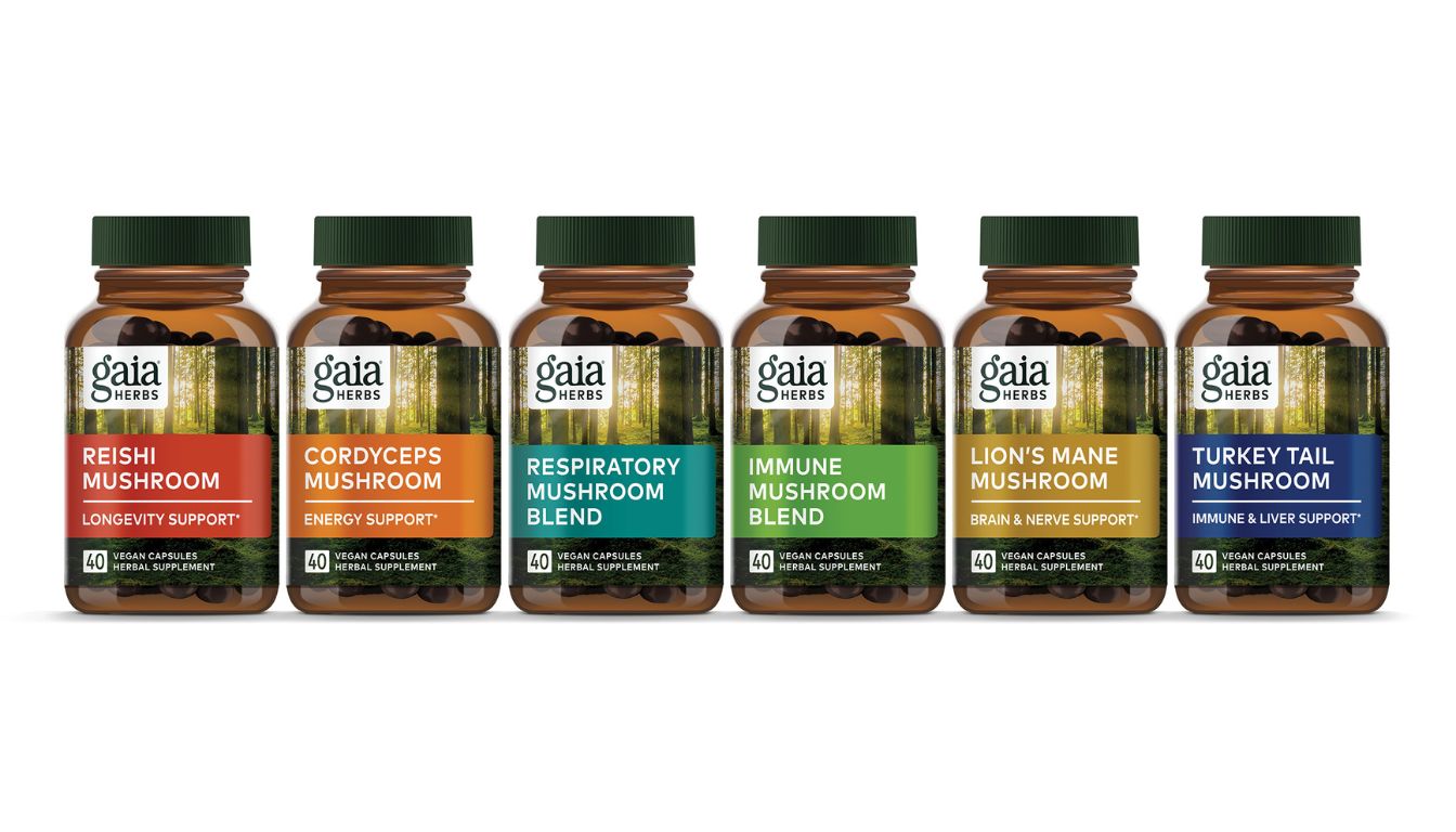 A lineup of six Gaia Herbs supplement bottles, each labeled with different types of mushroom blends and their specific health benefits.