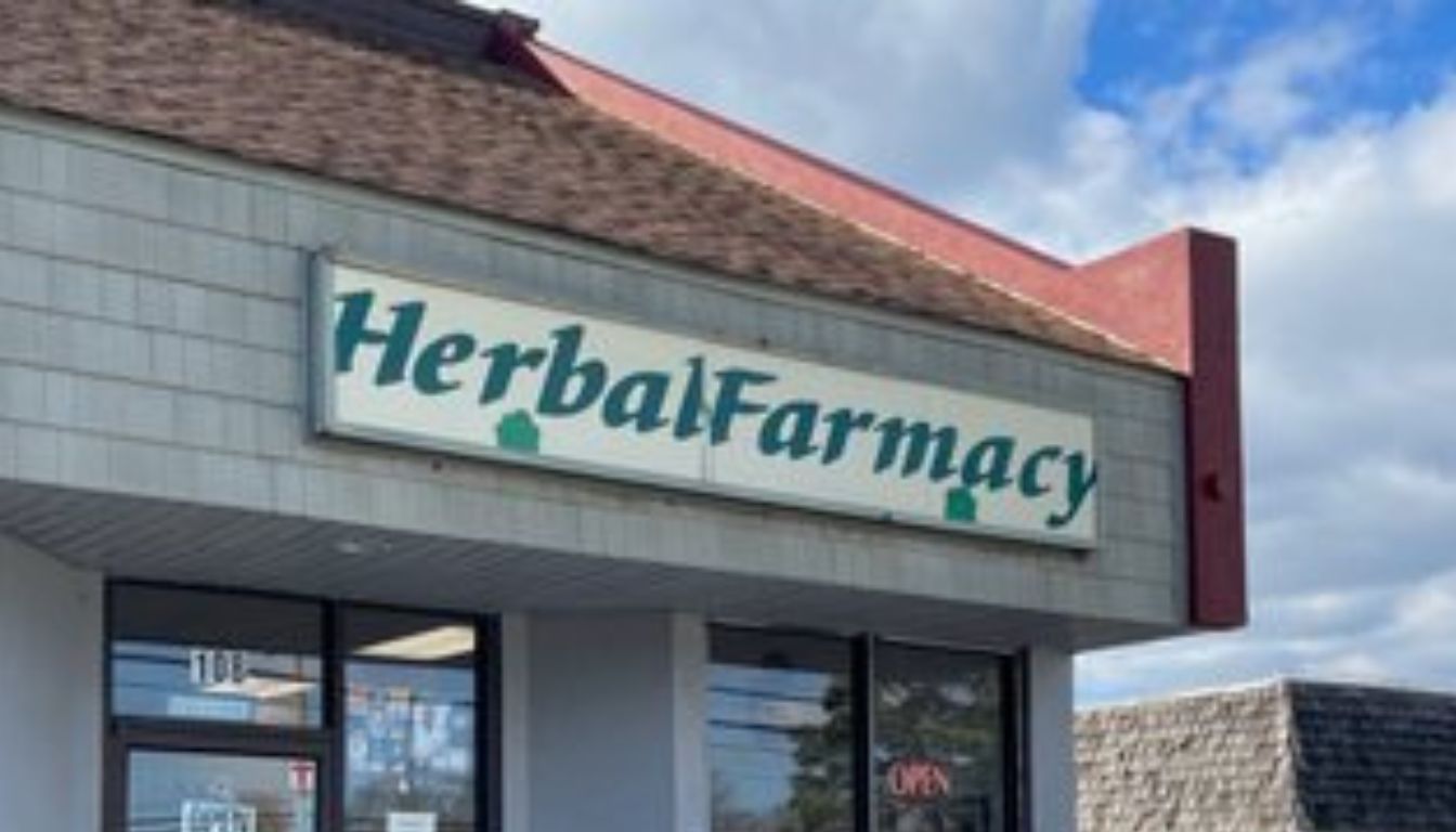 Storefront of Herbal Farmacy with a sign displaying the store name above the entrance.