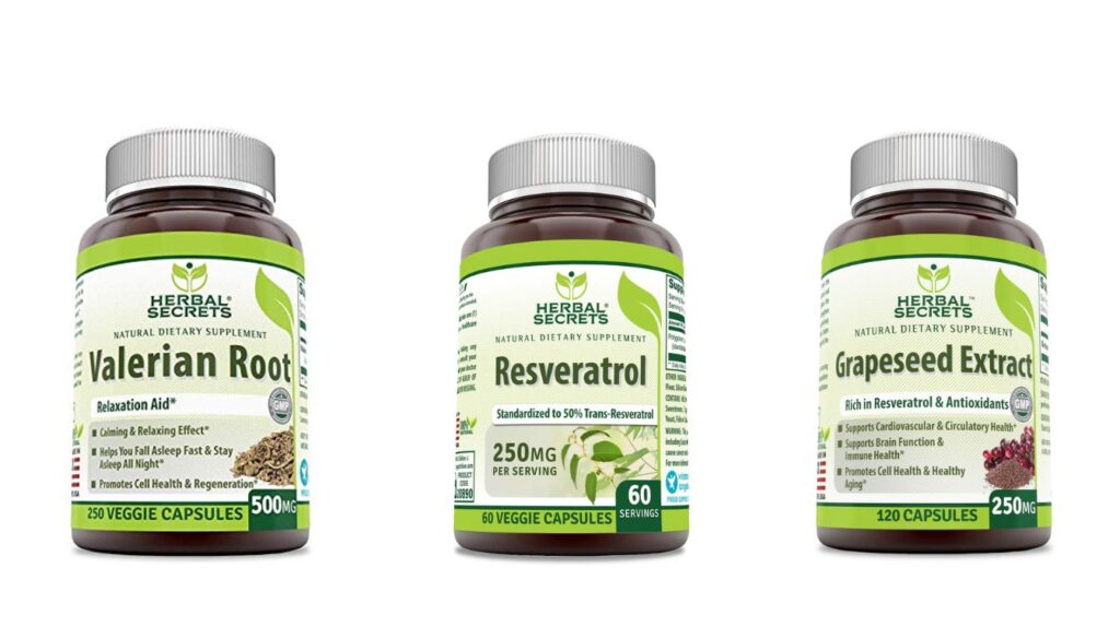 Three bottles of Herbal Secrets supplements: Valerian Root, Resveratrol, and Grapeseed Extract on a white surface.