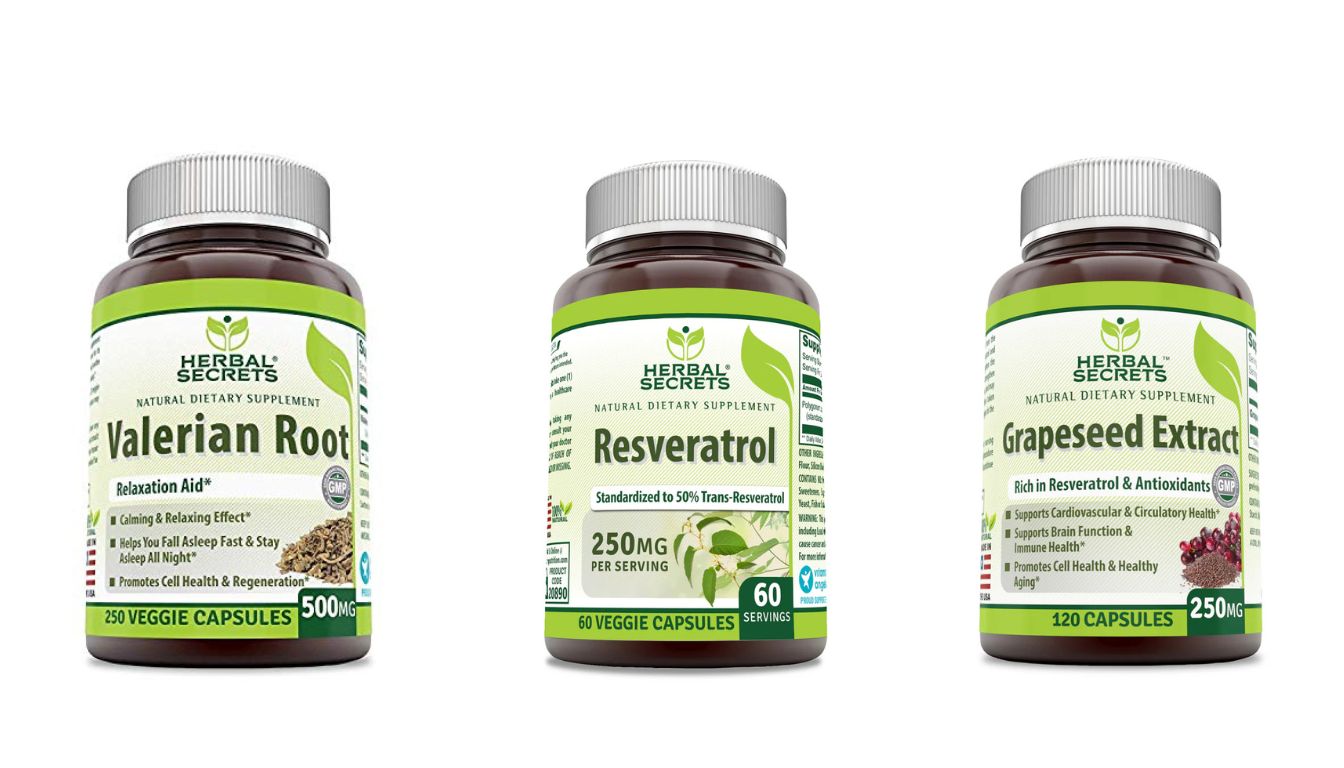 Three bottles of Herbal Secrets supplements: Valerian Root, Resveratrol, and Grapeseed Extract on a white surface.