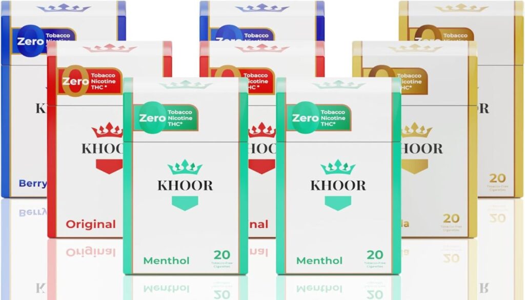 A semi-circle arrangement of colorful Khoor cigarette packs, each labeled with a different flavor variant and marked as tobacco, nicotine, and THC-free.