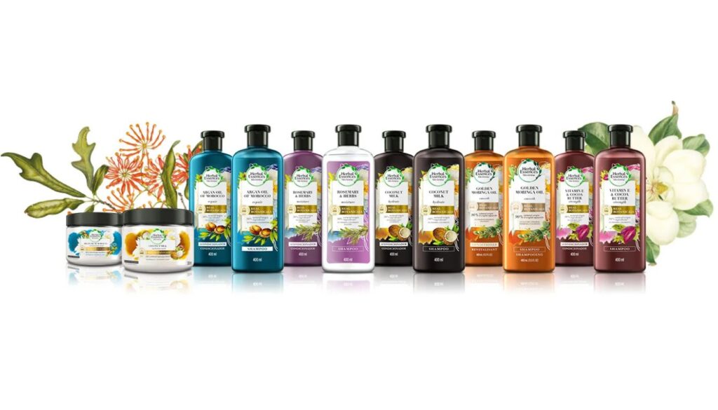 A lineup of Herbal Essences hair care products featuring various natural ingredient formulations.