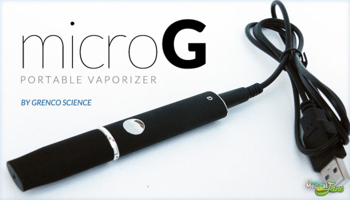 MicroG portable vaporizer by Grenco Science with USB charging cable.