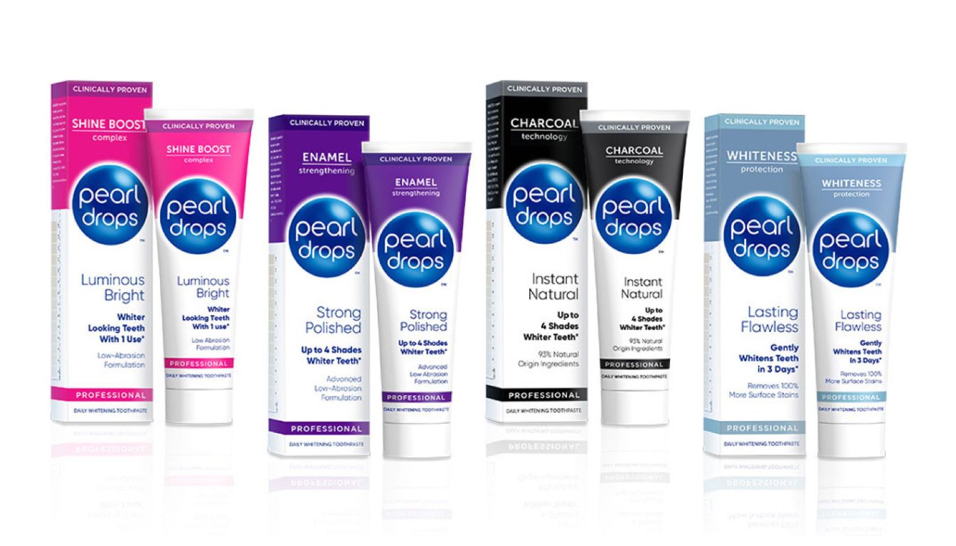 A lineup of Pearl Drops teeth whitening toothpaste products, featuring various formulations for different whitening needs.