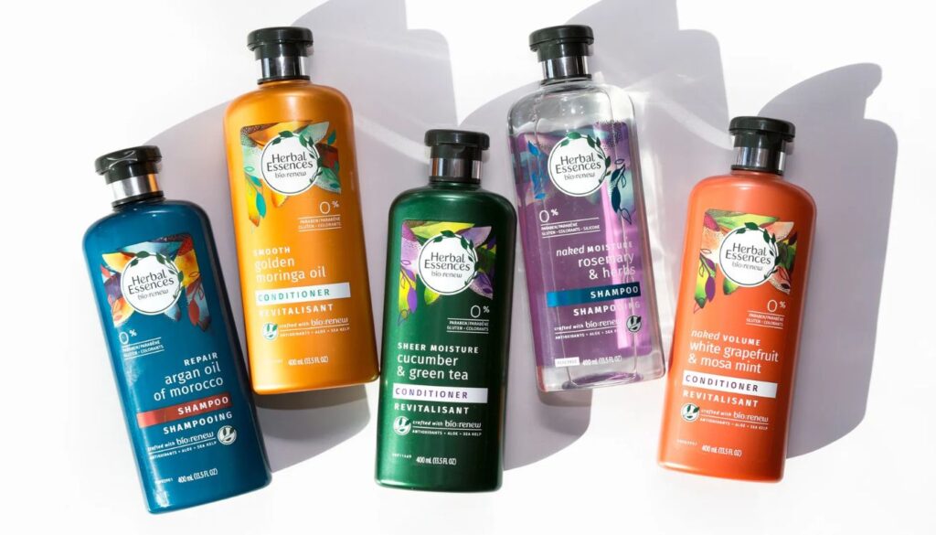 A collection of five Herbal Essences bio:renew hair care products, including shampoos and conditioners, arranged on a white background.