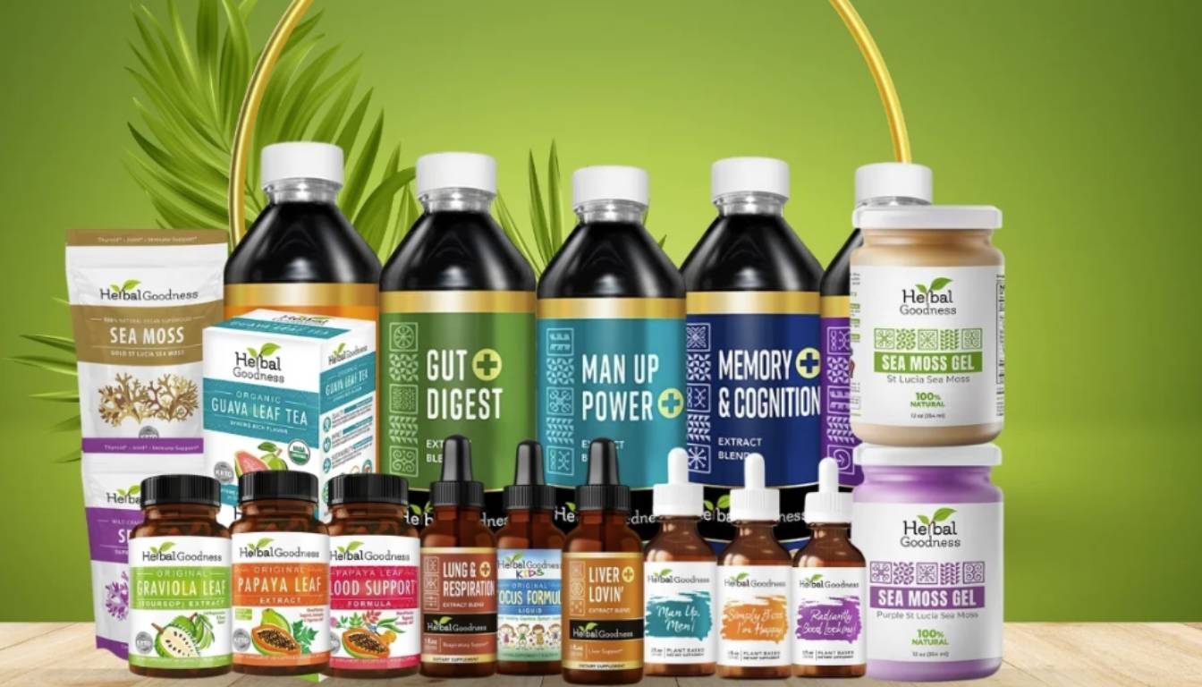 A collection of Herbal Goodness products including sea moss, guava leaf tea, and various herbal extracts and supplements, displayed against a green background with palm leaves.