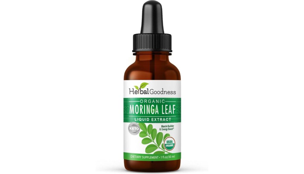 A brown glass bottle labeled "Herbal Goodness Organic Moringa Leaf Liquid Extract" with a black dropper cap. The label highlights that it is a dietary supplement, USDA organic, and promotes muscle building and energy boost.