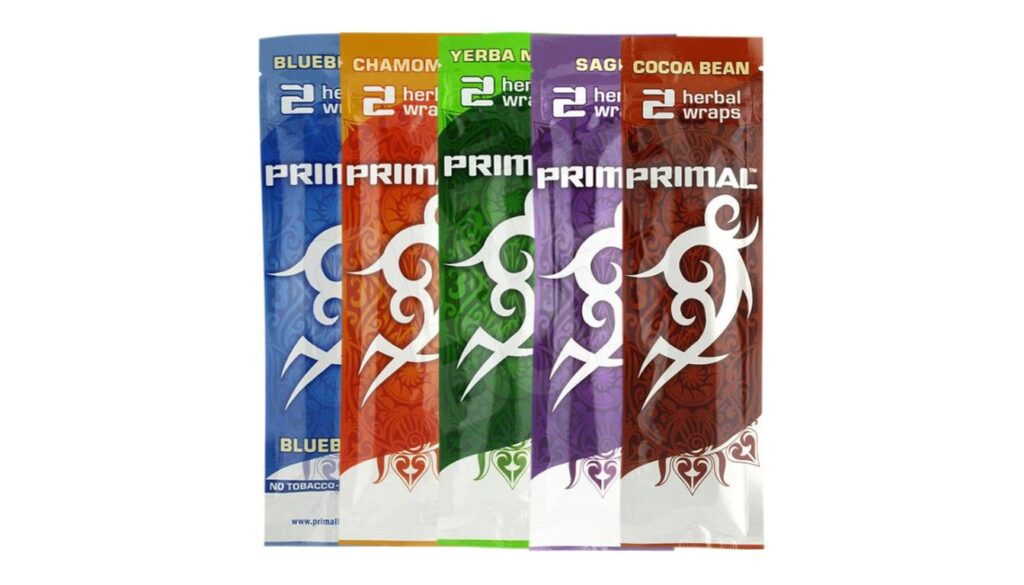 A variety of Primal herbal wraps in different flavors, including Blueberry, Chamomile, Yerba Mate, Sage, and Cocoa Bean, displayed in colorful packaging.