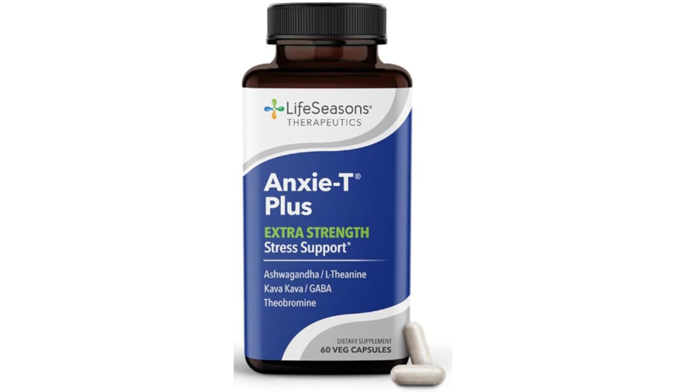 A bottle of LifeSeasons Therapeutics Anxie-T Plus Extra Strength Stress Support dietary supplement with two capsules beside it.