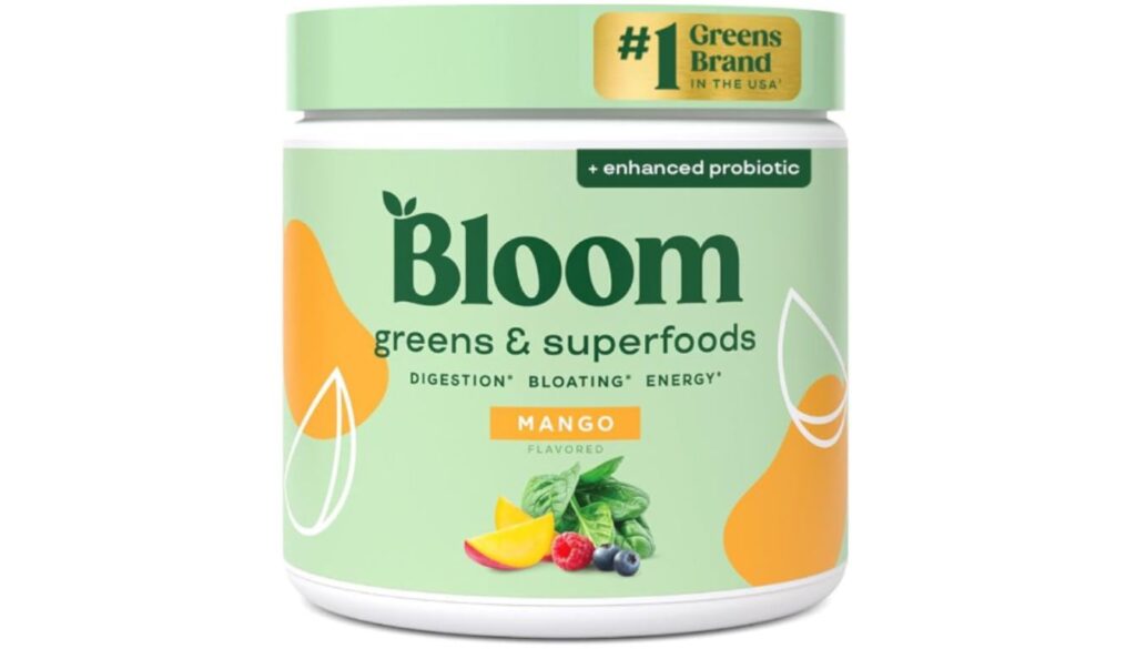 A container of Bloom Nutrition Greens & Superfoods powder, mango flavored, with enhanced probiotics.