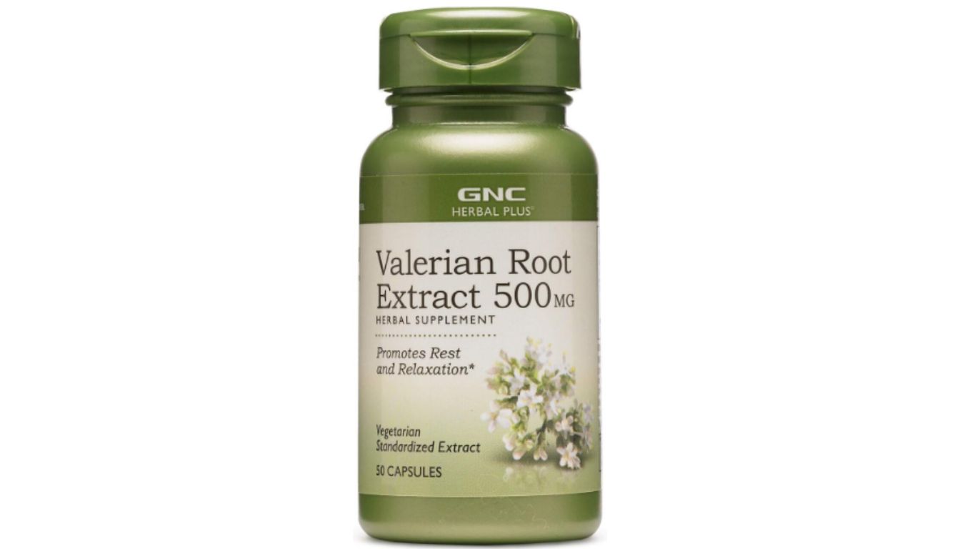 A green bottle of GNC Herbal Plus Valerian Root Extract 500 MG herbal supplement.