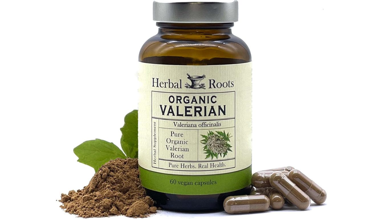 A bottle of Herbal Roots Organic Valerian Root capsules with a green label highlighting the natural ingredients and health benefits.