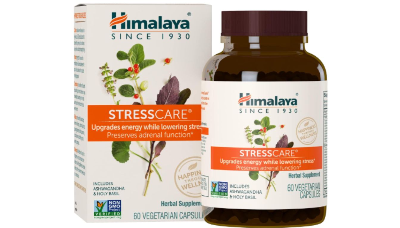 A bottle and box of Himalaya StressCare herbal supplement, which includes Ashwagandha and Holy Basil, and claims to upgrade energy while lowering stress and preserving adrenal function.