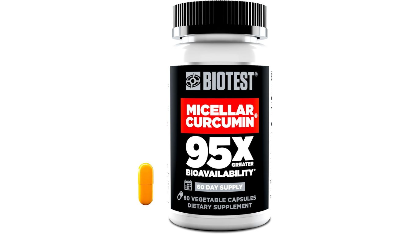 A bottle of Biotest Micellar Curcumin dietary supplement with a single yellow capsule beside it.