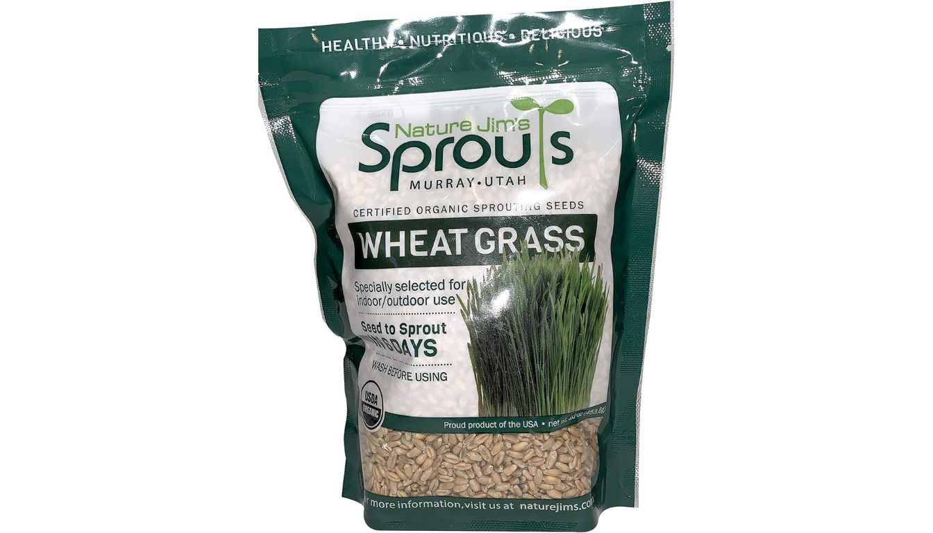 A package of Nature Jim's Sprouts Wheatgrass Organic Seeds, showcasing a clear section with visible seeds.