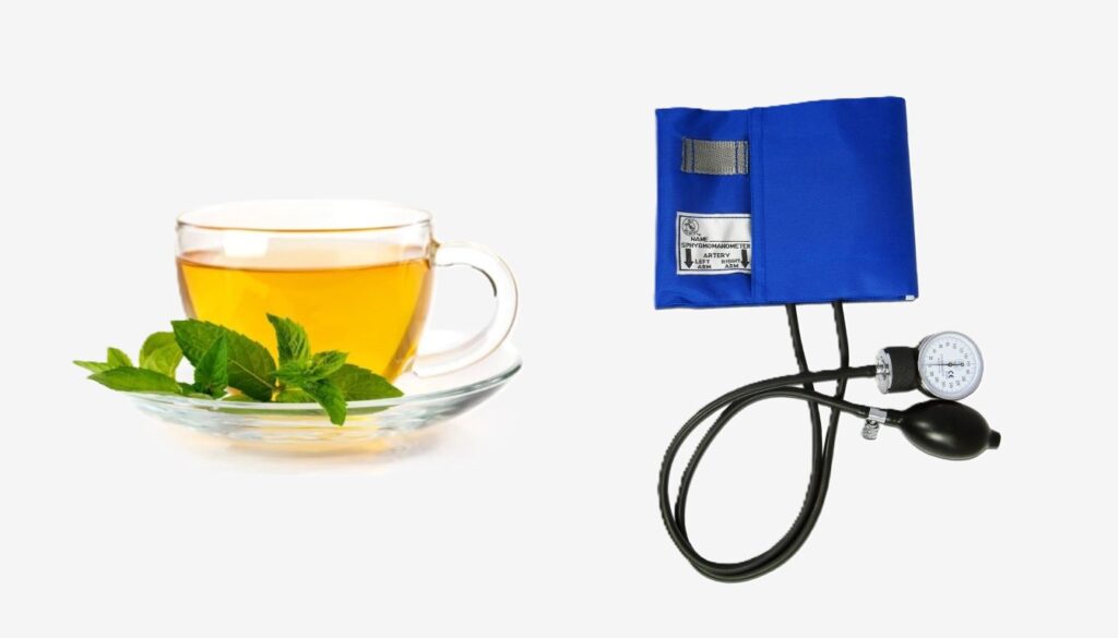 A cup of green tea garnished with fresh mint leaves, set beside a blue blood pressure monitor.