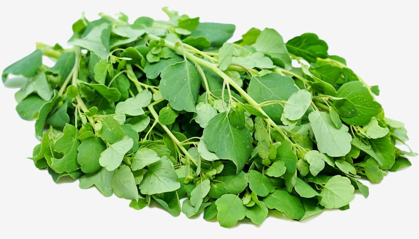 A bundle of fresh papalo leaves with vibrant green color, placed on a rustic wooden surface, showcasing their unique shape and texture.