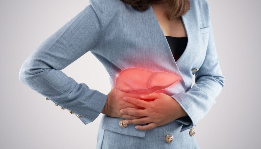 Person holding their right abdomen with liver pain highlighted in red.