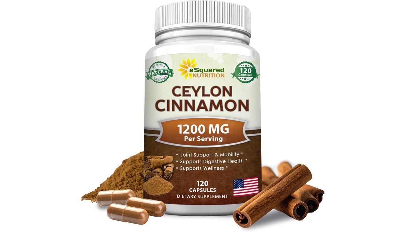 Bottle of Eco Bounty Ceylon Cinnamon capsules with 1200 mg per serving, surrounded by cinnamon sticks and powder.