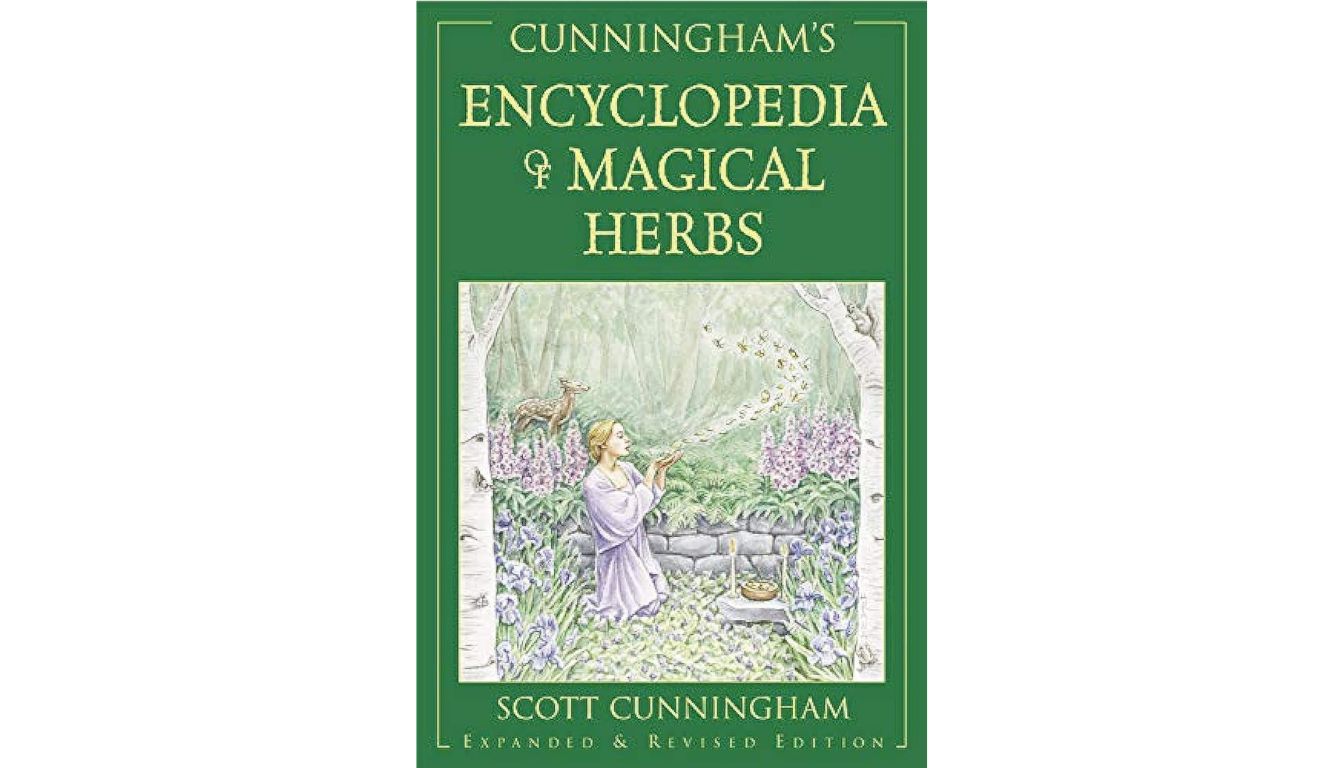 Cover of Cunningham’s Encyclopedia of Magical Herbs featuring a forest ritual scene