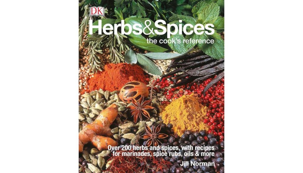 Cover of Herbs & Spices: The Cook’s Reference by Jill Norman with vibrant culinary ingredients